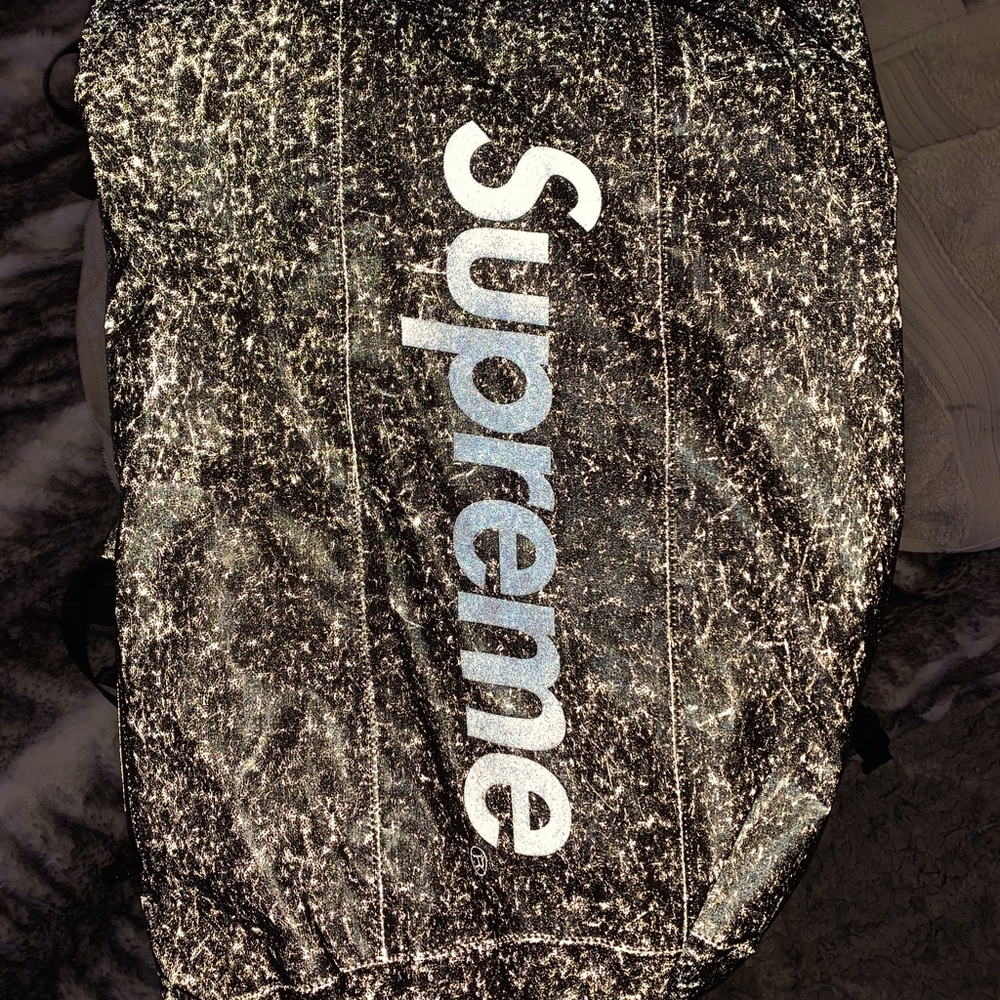 Authentic Supreme back pack Reflects when light shines on it.made in Italy.